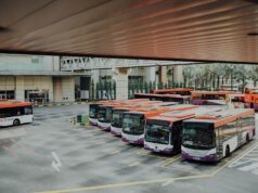 orange and white bus lot
