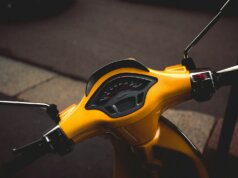 photo of yellow motor scooter