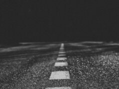grayscale photo of empty road