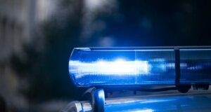 a close up of a police car with its lights on